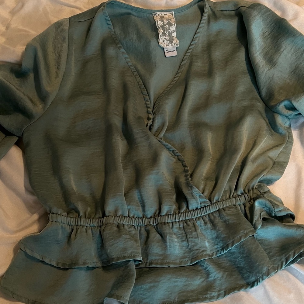 It’s a green blouse